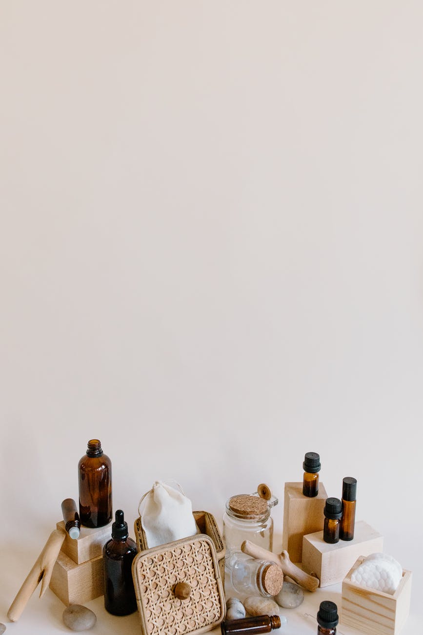 brown bottles on wooden blocks